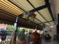 Tenda da giardino, visuale interna, affiancata con gronda