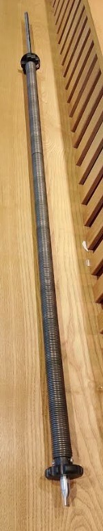 Molla di richiamo per tende da sole con manovra a molla